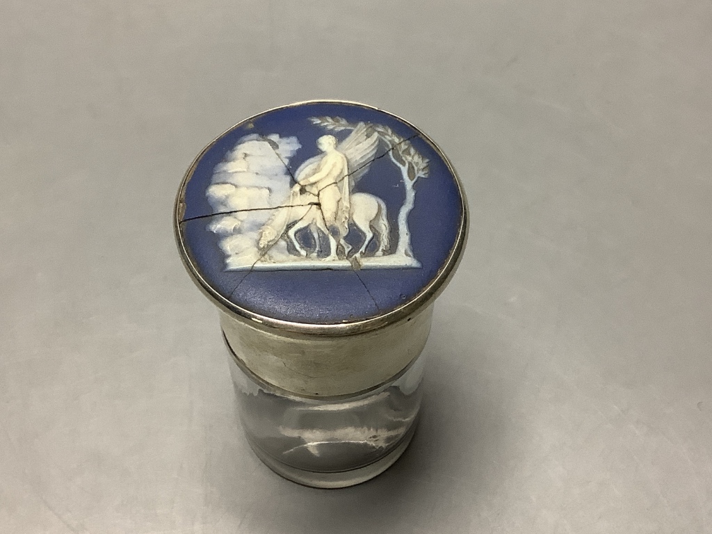 A pair of modern part engine turned silver ashtrays, 95 mm, 176 g and a silver and Wedgwood plaque mounted salt glass salts bottle, a.f.